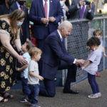 
              President Joe Biden greets children as he visits the Capitol Child Development Center, Friday, Oct. 15, 2021, in Hartford, Conn. (AP Photo/Evan Vucci)
            