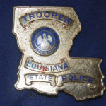 
              FILE - This May 10, 2019, file photo, provided by the Louisiana State Police shows blood stains on the shield and uniform of Master Trooper Chris Hollingsworth, in West Monroe, La., after troopers punched, dragged and stunned Black motorist Ronald Greene during his fatal 2019 arrest. (Louisiana State Police via AP, File)
            