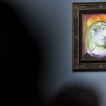 Pablo Picasso's "Femme au béret rouge-orange" is on display for auction at the Bellagio hotel and casino Saturday, Oct. 23, 2021, in Las Vegas. Sotheby's and the MGM Resorts Fine Art Collection hosted the auction, which raised $109 million from eleven pieces. (AP Photo/Ellen Schmidt)