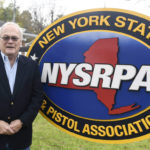 
              New York State Rifle & Pistol Association president Tom King poses for a photo Thursday, Oct. 28, 2021, in East Greenbush, N.Y. The Supreme Court is about to hear a gun rights case that could lead to more guns on the streets of New York and Los Angeles and threaten bans on guns in subways, airports, bars, churches, schools and other places where people gather. (AP Photo/Hans Pennink)
            