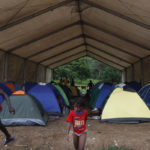 
              Tents are set up at a shelter for migrants in Lajas Blancas, Darien, Panama, Saturday, Oct. 23, 2021. A rising number of female migrants have reported suffering sexual abuse while crossing the treacherous Darien Gap between Colombia and Panama. Seeking to draw attention to the issue, a group of Panamanian lawmakers travelled Saturday on a fact-finding mission to speak with victims and authorities in the remote province. (AP Photo/Ana Renteria)
            