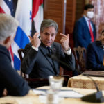 
              Secretary of State Antony Blinken accompanied by Israeli Foreign Minister Yair Lapid, left, and United Arab Emirates Foreign Minister Sheikh Abdullah bin Zayed al-Nahyanin, right, speaks at a joint news conference at the State Department in Washington, Wednesday, Oct. 13, 2021. (AP Photo/Andrew Harnik, Pool)
            