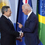 
              U.S. President Joe Biden, right, speaks with Italy's Prime Minister Mario Draghi as he arrives at the La Nuvola conference center for the G20 summit in Rome, Saturday, Oct. 30, 2021. The two-day Group of 20 summit is the first in-person gathering of leaders of the world's biggest economies since the COVID-19 pandemic started. (AP Photo/Domenico Stinellis)
            