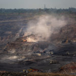 
              Mining is in progress at an open-cast mine near Dhanbad, an eastern Indian city in Jharkhand state, Friday, Sept. 24, 2021. Efforts to fight climate change are being held back in part because coal, the biggest single source of climate-changing gases, provides cheap electricity and supports millions of jobs. It's one of the dilemmas facing world leaders gathered in Glasgow, Scotland this week in an attempt to stave off the worst effects of climate change. (AP Photo/Altaf Qadri)
            