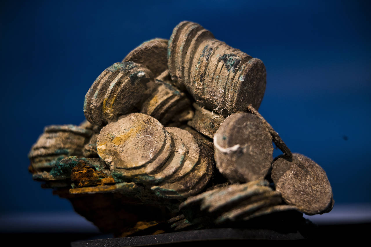 FILE - In this Nov. 30, 2012 file photo, a block of encrusted silver coins from the shipwreck of a ...