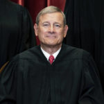
              FILE - In this April 23, 2021, file photo Chief Justice John Roberts sits during a group photo at the Supreme Court in Washington. The Supreme Court on Friday rejected a plea from South Carolina to reimpose the death penalty on a South Carolina inmate whose death sentence stood for two decades until a federal appeals court threw it out in August. Chief Justice John Roberts did not comment in denying the state's request to stop the clock on a lower court order in favor of inmate Sammie Lee Stokes. (Erin Schaff/The New York Times via AP, Pool, File)
            