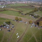 
              An aerial photograph shows a makeshift camp housing migrants mostly from Afghanistan, in Velika Kladusa, Bosnia, Tuesday, Oct. 12, 2021. Hundreds of migrants _ including small children, babies and elderly people _ have set up a new improvised camp in northwest Bosnia, determined to brave worsening weather and tough Croatian border police for a chance to reach Western Europe.(AP Photo)
            