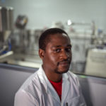 
              Donald Mjonono, an engineer at Afrigen Biologics and Vaccines ​in Cape Town, South Africa, poses for a photograph Tuesday, Oct. 19, 2021. In a pair of warehouses converted into labs, a team of Afrigen scientists is assembling the equipment needed to reverse engineer Moderna's coronavirus vaccine. The scientists are effectively making an end run around an industry that has vastly prioritized rich countries over poor in vaccine sales and manufacturing. ​(AP Photo/Jerome Delay)
            