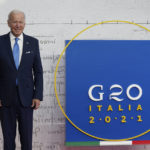 
              U.S. President Joe Biden poses for a photograph as he arrives at the La Nuvola conference center for the G20 summit in Rome, Saturday, Oct. 30, 2021. The two-day Group of 20 summit is the first in-person gathering of leaders of the world's biggest economies since the COVID-19 pandemic started. (Kevin Lamarque/Pool Photo via AP)
            