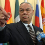 
              FILE - U.S. Secretary of State Colin Powell points to a reporter during a news conference outside of the United Nations Security Council Chambers, Friday, March 7, 2003. Colin Powell, former Joint Chiefs chairman and secretary of state, has died from COVID-19 complications. In an announcement on social media Monday, Oct. 18, 2021 the family said Powell had been fully vaccinated. (AP Photo/Ed Betz, file)
            