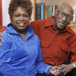 
              FILE- In this Jan. 14, 2009, file photo, civil rights leader and political activist Timuel Black and his wife, Zenobia Johnson-Black, sit in their Chicago apartment. Timuel Black, a retired sociology and anthropology professor with City Colleges of Chicago, a former Chicago Public Schools high school history teacher and a pioneer in the independent Black political movement who coined the phrase "plantation politics," died Wednesday, Oct. 13, 2021, according to his wife. (AP Photo/M. Spencer Green, File)
            