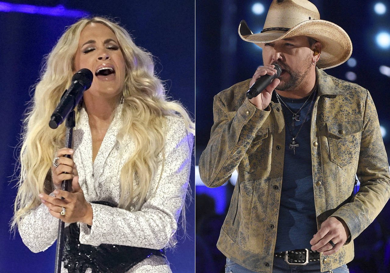 Carrie Underwood performs at the CMT Music Awards in Nashville, Tenn., on May 5, 2021, left, and  J...