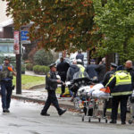 
              FILE - In this Oct. 27, 2018 file photo, first responders surround the Tree of Life Synagogue, rear center, in Pittsburgh, where a shooter opened fire and 11 people were killed in America's deadliest antisemitic attack. As the three-year mark since the massacre at the Tree of Life synagogue approaches, survivors are planning now-familiar annual rituals of remembrance, the criminal case involving the suspect plods on and the massacre site is in line for restoration. (AP Photo/Gene J. Puskar, File)
            