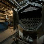 The old boiler in the Neptune basement looks like a locomotive; it reached the end of line years ago. (Feliks Banel/KIRO Radio)