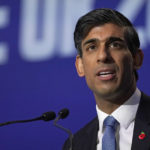 
              Britain's Chancellor of the Exchequer Rishi Sunak makes a speech at the COP26 U.N. Climate Summit in Glasgow, Scotland, Wednesday, Nov. 3, 2021. The British government plans to make the U.K. "the world's first net-zero aligned financial center" as companies and investors seek to profit from the drive to build a low-carbon economy. Sunak will lay out the government's plans during a speech Wednesday as top financial officials from around the world meet at the U.N. climate conference in Glasgow, Scotland. (AP Photo/Alberto Pezzali)
            