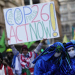 
              Extension Rebellion activists protest outside JP Morgan premises as they take part in a demonstration against 'Greenwashing' (an attempt to make people believe that your company or government is doing more to protect the environment than it really is) near the COP26 U.N. Climate Summit in Glasgow, Scotland, Wednesday, Nov. 3, 2021. (AP Photo/Alastair Grant)
            