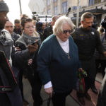 
              Sarah Hughes, right, a great aunt of Anthony Huber and his girlfriend Hannah Gittings, left, leave the Kenosha County Courthouse, Friday, Nov. 19, 2021 in Kenosha, Wis. Kyle Rittenhouse was acquitted of all charges after pleading self-defense in the deadly Kenosha shootings that became a flashpoint in the nation's debate over guns, vigilantism and racial injustice. (AP Photo/Paul Sancya)
            