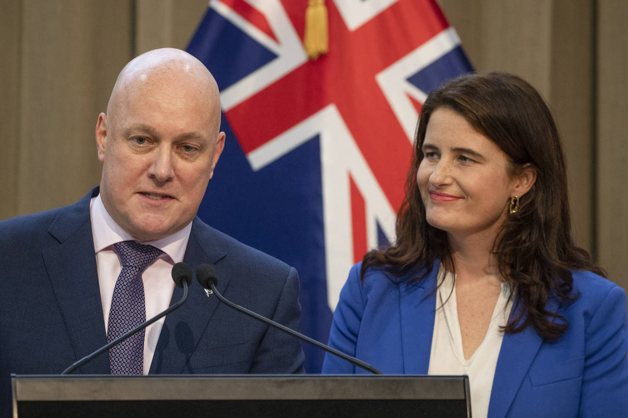 New National party leader Christopher Luxon, left, and deputy leader Nicola Willis address a press ...