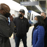 
              U.S. Rep. Pramila Jayapal, D-Wash., second from right, leader of the Congressional Progressive Caucus, talks with Ron Lewis, left, executive director of design, engineering and construction management for Sound Transit, Tuesday, Nov. 9, 2021, during a tour that included the Northgate Station on the Link light rail system in Seattle. Jayapal's visit came after the House approved a $1 trillion package of road and other infrastructure projects late Friday after Democrats resolved a months-long standoff between progressives and moderates. (AP Photo/Ted S. Warren)
            