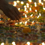 
              Devotee light oil lamps to Hindu Goddess Lakshmi during the Hindu festival of lights, Diwali at Vishnu temple in Bangkok, Thailand, Thursday, Nov. 4, 2021. Diwali is one of Hinduism's most important festivals, dedicated to the worship of the goddess of wealth Lakshmi. (AP Photo/Sakchai Lalit)
            