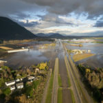 
              Floodwaters cover Highway 1 in Abbotsford, British Columbia, Tuesday, Nov. 16, 2021. (Jonathan Hayward/The Canadian Press via AP)
            