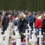 
              People lay flowers at Vukovar's memorial cemerety, in Vukovar, eastern Croatia, Thursday, Nov. 18, 2021. Thousands joined memorial events marking the 30th anniversary of the fall of the eastern town of Vukovar to the Serb-led Yugoslav army during Croatia's 1991-95 independence war. (AP Photo)
            