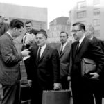 
              FILE - In this 1964 photo, a reporter questions Teamsters President Jimmy Hoffa outside the federal courthouse in Chattanooga, Tenn., during Hoffa's trial that ended in a jury tampering conviction. The FBI's recent confirmation that it was looking at a spot near a New Jersey landfill as the possible burial site of former Teamsters boss Jimmy Hoffa is the latest development in a search that began when he disappeared in 1975. (Chattanooga Times Free Press via AP, File)
            