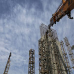 
              An Indian laborer works at a flyover construction site in Jammu, India, Tuesday, Nov. 30, 2021. India’s economy grew by 8.4% in the July-September quarter from the same period a year earlier, the government announced Tuesday, raising hopes of a recovery after the country suffered historic contractions sparked by the coronavirus pandemic. (AP Photo/Channi Anand)
            