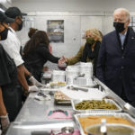 
              President Joe Biden and first lady Jill Biden arrive to assemble Thanksgiving meal kits during a visit to DC Central Kitchen in Washington, Tuesday, Nov. 23, 2021. (AP Photo/Susan Walsh)
            