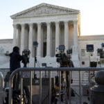 
              The U.S. Supreme Court is seen on Capitol Hill in Washington, Wednesday, Nov. 3, 2021, as television cameras are set up. The Supreme Court is set to hear arguments in a gun rights case that centers on New York’s restrictive gun permit law and whether limits the state has placed on carrying a gun in public violate the Second Amendment. (AP Photo/Jose Luis Magana)
            