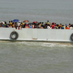 
              Rohingya refugees travel on a naval vessel that will take them to Bhasan Char island, in Chittagong, Bangladesh, Thursday, Nov. 25, 2012.  Thousands have been relocated on the island in the Bay of Bengal from crammed camps near the Myanmar border. (AP Photo)
            