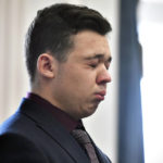 
              Kyle Rittenhouse closes his eyes and cries as he is found not guilty on all counts at the Kenosha County Courthouse in Kenosha, Wis., on Friday, Nov. 19, 2021. The jury came back with its verdict after close to 3 1/2 days of deliberation. (Sean Krajacic/The Kenosha News via AP, Pool)
            
