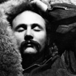 
              This image released by Graham Nash shows David Crosby in Los Angeles in 1969. Nash, of the supergroup Crosby, Stills, Nash and Young, started taking photos long before he started making music. His collection of photos in the book "A Life in Focus: The Photography of Graham Nash," captures fellow artists like Bob Dylan, Joni Mitchell, Mama Cass Elliott, Twiggy and, of course, Crosby, Stills, Nash and Young.  (Graham Nash via AP)
            