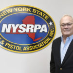 
              FILE- New York State Rifle & Pistol Association president Tom King poses for a photo Oct. 28, 2021, in East Greenbush, N.Y.  The Supreme Court is set to hear arguments Wednesday, Nov. 3, in a gun rights case that centers on New York’s restrictive gun permit law and whether limits the state has placed on carrying a gun in public violate the Second Amendment. Gun rights advocates including the New York State Rifle & Pistol Association and two private citizens are challenging the law. (AP Photo/Hans Pennink, File)
            