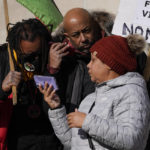 
              Justin Blake, left, uncle of Jacob Blake, listens to the verdict being read outside the Kenosha County Courthouse, Friday, Nov. 19, 2021 in Kenosha, Wis. Kyle Rittenhouse was acquitted of all charges after pleading self-defense in the deadly Kenosha shootings that became a flashpoint in the nation's debate over guns, vigilantism and racial injustice. (AP Photo/Paul Sancya)
            