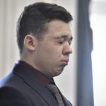 
              Kyle Rittenhouse closes his eyes and cries as he is found not guilt on all counts at the Kenosha County Courthouse in Kenosha, Wis., on Friday, Nov. 19, 2021. The jury came back with its verdict afer close to 3 1/2 days of deliberation.  (Sean Krajacic/The Kenosha News via AP, Pool)
            