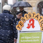 
              A sign reads "Test station""  in front of a pharmacy in Vilshofen, Germany, Tuesday, Nov. 30, 2021. The number of new corona infections per 100,000 inhabitants in the district of Passau is currently over 1000. (Armin Weigel/dpa via AP)
            