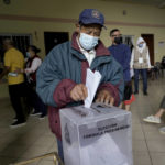 
              A man votes during general elections in Tegucigalpa, Honduras, Sunday, Nov. 28, 2021. (AP Photo/Moises Castillo)
            