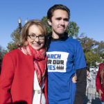 
              Former congresswoman and gun violence survivor Gabby Giffords, D-Ariz., speaks with Parkland survivor and activist David Hogg during a rally against gun violence, outside of the U.S. Supreme Court in Washington, Wednesday, Nov. 3, 2021. The Supreme Court is set to hear arguments in a gun rights case that centers on New York's restrictive gun permit law and whether limits the state has placed on carrying a gun in public violate the Second Amendment.. (AP Photo/Jose Luis Magana)
            
