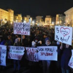 
              Far right activists gather at the Maidan to march to the Presidential Office where they will demand that administration officials are dismissed in Kyiv, Ukraine, Wednesday, Dec.1 2021. Activists demanded the resignation of Head of Ukraine's Presidential Office Andriy Yermak. (AP Photo/Efrem Lukatsky)
            