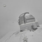 
              In this webcam image provided by the Canada-France-Hawaiʻi Telescope, snow is seen atop the summit of Mauna Kea in Hawaii on Monday, Dec. 6, 2021. A strong storm packing high winds and extremely heavy rain flooded roads and downed power lines and tree branches across Hawaii. (Canada-France-Hawaiʻi Telescope via AP)
            