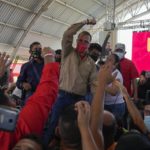 
              Former foreign minister Jorge Arreaza greets supporters during an event in Barinas, Venezuela, Sunday, Dec. 5, 2021. President Nicolas Maduro named Arreaza via a livestream as the ruling party's candidate for the gubernatorial race for Barinas state. The announcement came less than a week after the country's highest court disqualified opposition candidate Freddy Superlano for the governorship of Barinas as he was leading the vote count, a move that has become emblematic of what the opposition says are unfair election conditions. (AP Photo/Ariana Cubillos)
            