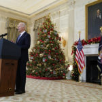 
              President Joe Biden delivers remarks on the November jobs report, in the State Dining Room of the White House, Friday, Dec. 3, 2021, in Washington. (AP Photo/Evan Vucci)
            