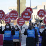 
              Protesters shout slogans during a rally outside of the Defense Ministry in Seoul, South Korea, Thursday, Dec. 2, 2021. The South Korean and U.S. defense chiefs met Thursday for their annual talks, as Washington pushes to reinforce alliances with its partners to curb mounting challenges from China and increasing North Korean nuclear threats. The letters read "Dismantle the Combined Forces Command." and "Return the Operational Control immediately." (AP Photo/Lee Jin-man)
            