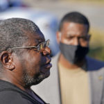 
              Resident Michael Coleman speaks to the media as EPA Administrator Michael Regan listens outside his home which abuts the Marathon Petroleum Refinery, as Regan tours Reserve, La., Tuesday, Nov. 16, 2021. (AP Photo/Gerald Herbert)
            