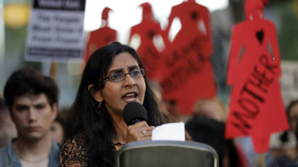 FILE - Seattle city councilmember Kshama Sawant speaks during a protest against family separation a...
