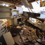 
              The remains of a house's kitchen after a tornado in Dawson Springs, Ky., Sunday, Dec. 12, 2021. A monstrous tornado, carving a track that could rival the longest on record, ripped across the middle of the U.S. on Friday. (AP Photo/Michael Clubb)
            