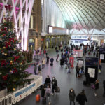 
              People walk past a Christmas tree in King's Cross train station, in London, the Eurostar hub to travel to European countries including France, Friday, Dec. 17, 2021. After the U.K. recorded its highest number of confirmed new COVID-19 infections since the pandemic began, France announced Thursday that it would tighten entry rules for those coming from Britain. Hours later, the country set another record, with a further 88,376 confirmed COVID-19 cases reported Thursday, almost 10,000 more than the day before. (AP Photo/Matt Dunham)
            