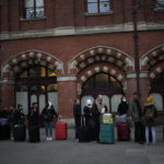 
              People queue up to travel on trains at London St Pancras International rail station, in London, the Eurostar hub to travel to European countries including France, Friday, Dec. 17, 2021. After the U.K. recorded its highest number of confirmed new COVID-19 infections since the pandemic began, France announced Thursday that it would tighten entry rules for those coming from Britain. Hours later, the country set another record, with a further 88,376 confirmed COVID-19 cases reported Thursday, almost 10,000 more than the day before. (AP Photo/Matt Dunham)
            