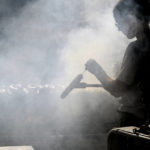 
              A woman grills bratwurst at a Christmas market during unseasonably warm weather in downtown Denver on Friday, Dec. 3, 2021. The Mile High City has already shattered its 87-year-old record for the latest measurable snowfall set on Nov. 21, 1934, and it's a little more than a week away from breaking an 1887 record of 235 consecutive days without snow. The scenario is playing out across much of the Rocky Mountains, as far north as Montana and in the broader Western United States, which is experiencing a megadrought that studies link to human-caused climate change. (AP Photo/Thomas Peipert)
            